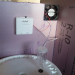 Fan and thermostat in place.